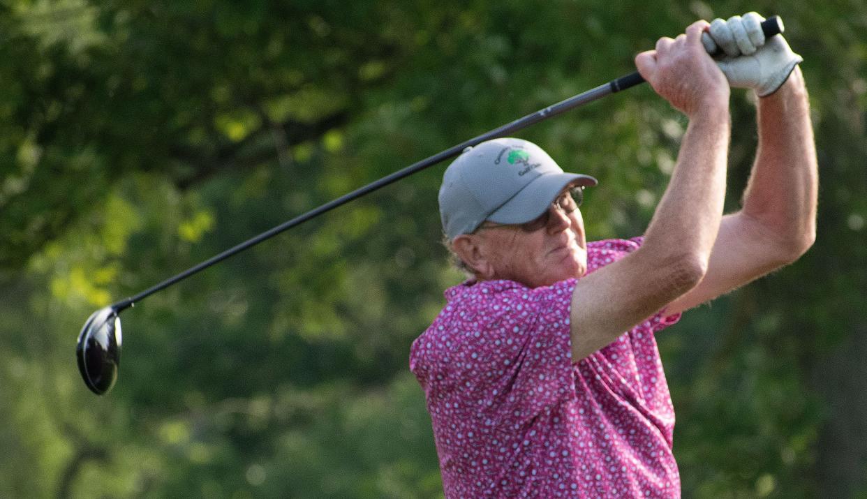 Don Chastain tees off the second hole at Cascades Golf Course in the Bloomington City Golf Tournament on July 9, 2023.