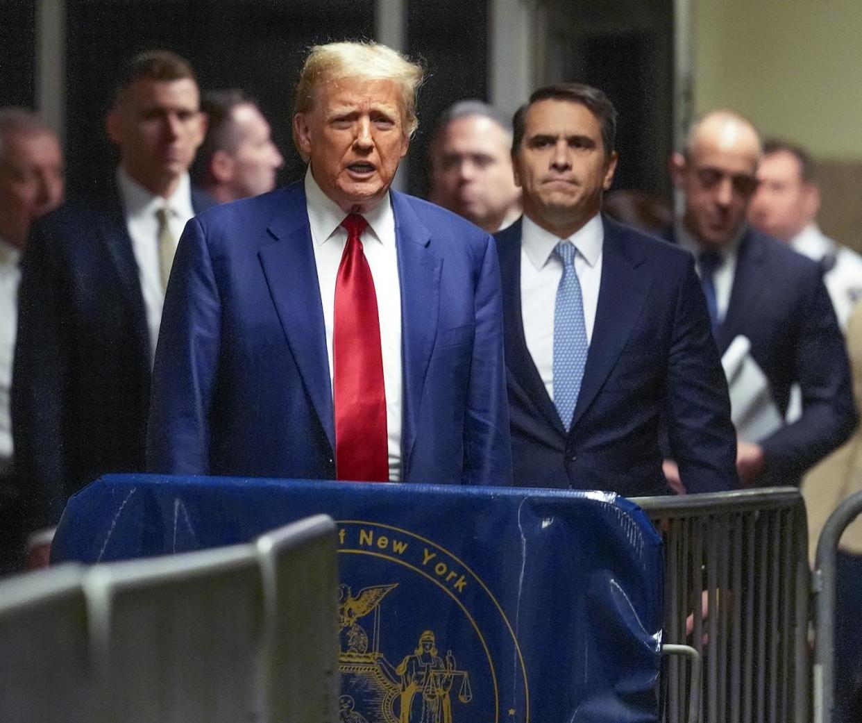 Donald Trump appears outside a Manhattan criminal court on March 25, 2024. <a href="https://www.gettyimages.com/detail/news-photo/former-u-s-president-donald-trump-makes-comments-as-he-news-photo/2105324295?adppopup=true" rel="nofollow noopener" target="_blank" data-ylk="slk:Mary Altaffer-Pool/Getty Images;elm:context_link;itc:0;sec:content-canvas" class="link ">Mary Altaffer-Pool/Getty Images</a>