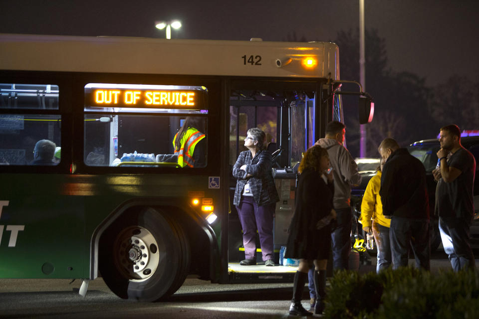 <p>The scene outside the Cascade Mall as people are evacuated on buses after three women were reportedly shot dead and a man critically injured following a shooting at the shopping center on September 23, 2016 in Burlington, Washington. The suspect is believed to still be at large. (Photo: Karen Ducey/Getty Images) </p>