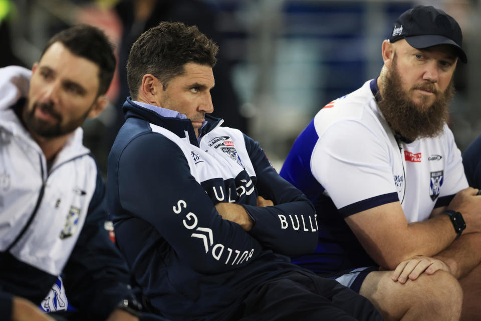 Bulldogs coach Trent Barrett (pictured middle) looks on during the round eight NRL match between the Canterbury Bulldogs and the Parramatta Eels.