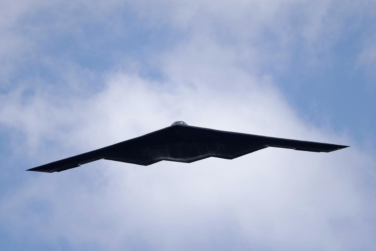 FILE - A B-2 Spirit stealth bomber, assigned to the 509th/131st Bomb Wings out of Whiteman Air Force Base, performs a flyover of Barnes-Jewish Hospital to honor healthcare professionals and essential employees fighting against the coronavirus May 8, 2020, in St. Louis. The Air Force has grounded its entire fleet of B-2 stealth bombers following an emergency landing and fire earlier this month, and none of the strategic aircraft will perform flyovers at this years' college bowl games. (AP Photo/Jeff Roberson, File)