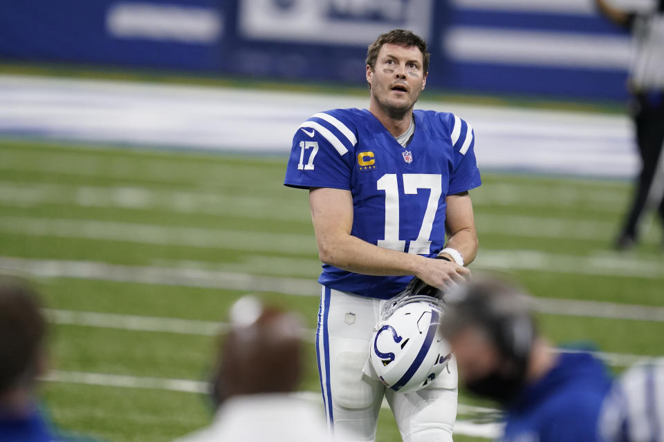 Indianapolis Colts quarterback Philip Rivers (17) walks off the field after throwing an interception during the second half of an NFL football game against the Jacksonville Jaguars, Sunday, Jan. 3, 2021, in Indianapolis. (AP Photo/Michael Conroy)