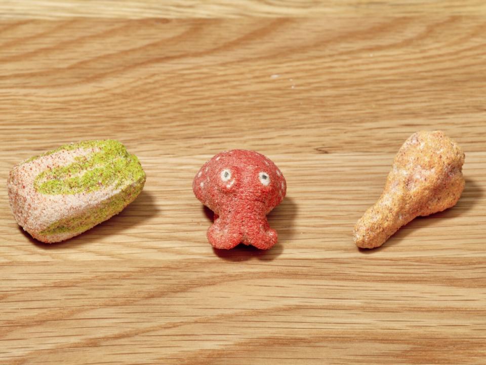 Miniature figures shaped like kimchi cabbage, squid and fried chicken