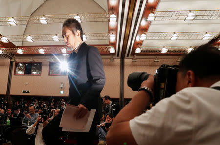 Jumpei Yasuda, the Japanese journalist held in Syria for more than three years, holds a news conference for the first time since his release last month, at the Japan National Press Club in Tokyo, Japan November 2, 2018. REUTERS/Issei Kato