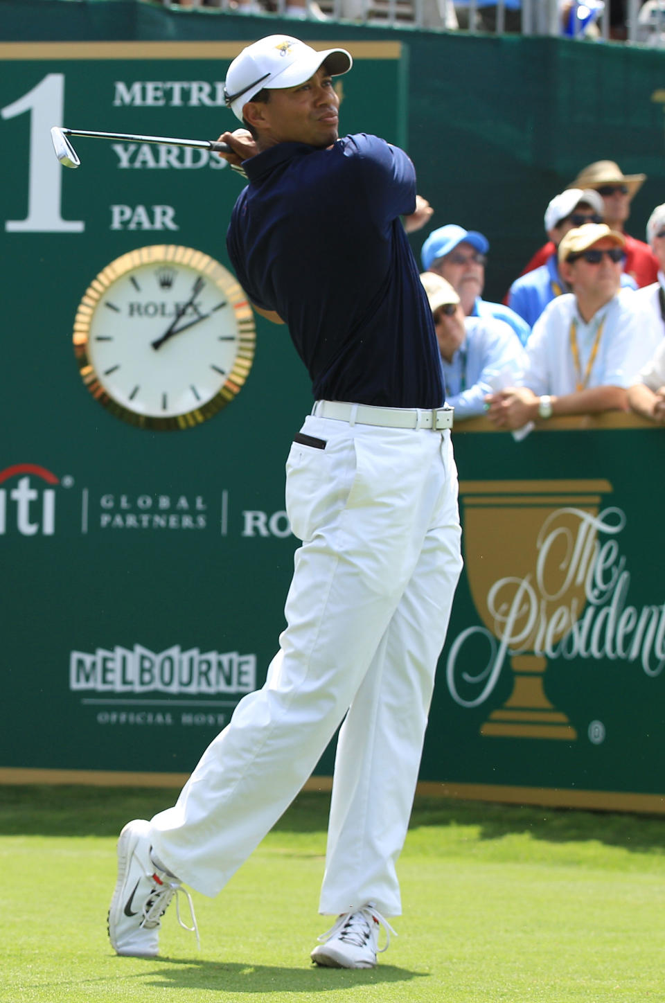 MELBOURNE, AUSTRALIA - NOVEMBER 17: Tiger Woods of the U.S. Team htis his tee shot on the first hole during the Day One Foursome Matches of the 2011 Presidents Cup at Royal Melbourne Golf Course on November 17, 2011 in Melbourne, Australia. (Photo by Mark Dadswell/Getty Images)