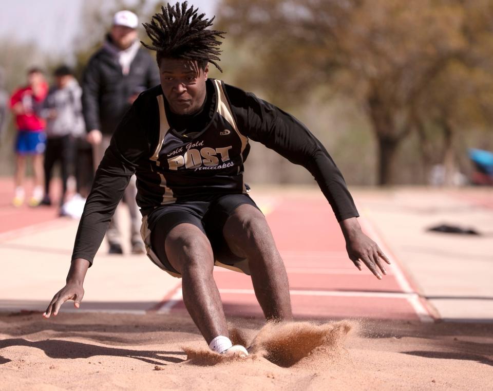 Post’s Isaiah Crawford competes in the District 5-2A boys long jump, Wednesday, April 5, 2023 at Slaughter Field in Sundown. 