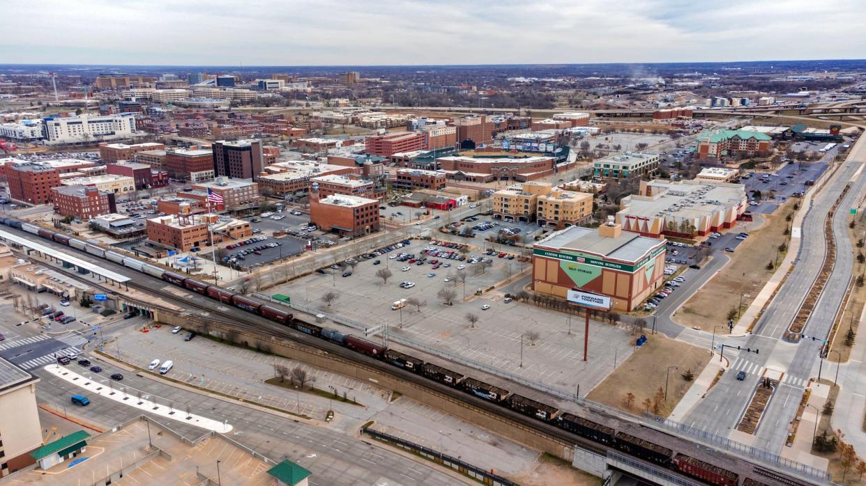 The Boardwalk at Bricktown, consisting of three 32-story towers and potentially a 134-story skyscraper, is proposed for a surface parking lot located next to the U-Haul warehouse in Lower Bricktown.
