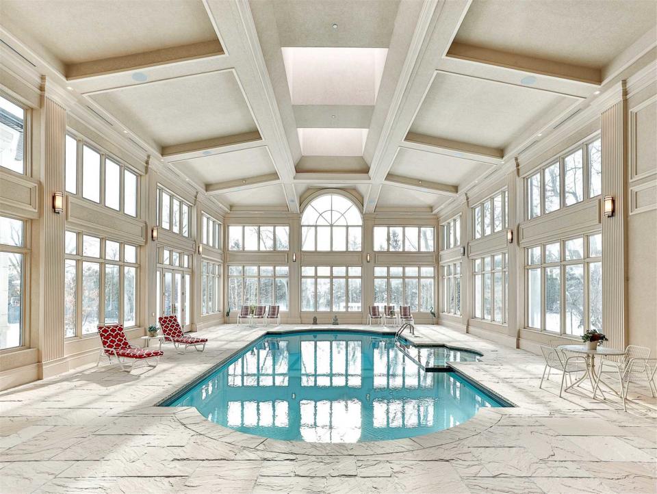 Of course there's a pool, and it's indoors so you can swim year-round. You'll have to wait until spring to hit the tennis court. (Zoocasa)