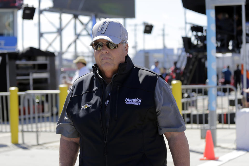 NASCAR team owner Rick Hendrick walks along pit road during auto race qualifying at Daytona International Speedway, Sunday, Feb. 9, 2020, in Daytona Beach, Fla. (AP Photo/Terry Renna)