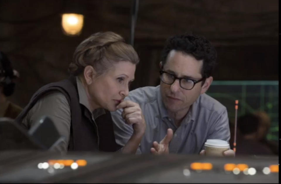 Carrie Fisher and J.J. Abrams on the set of ‘Star Wars: The Force Awakens’ (Photo: Walt Disney/YouTube)