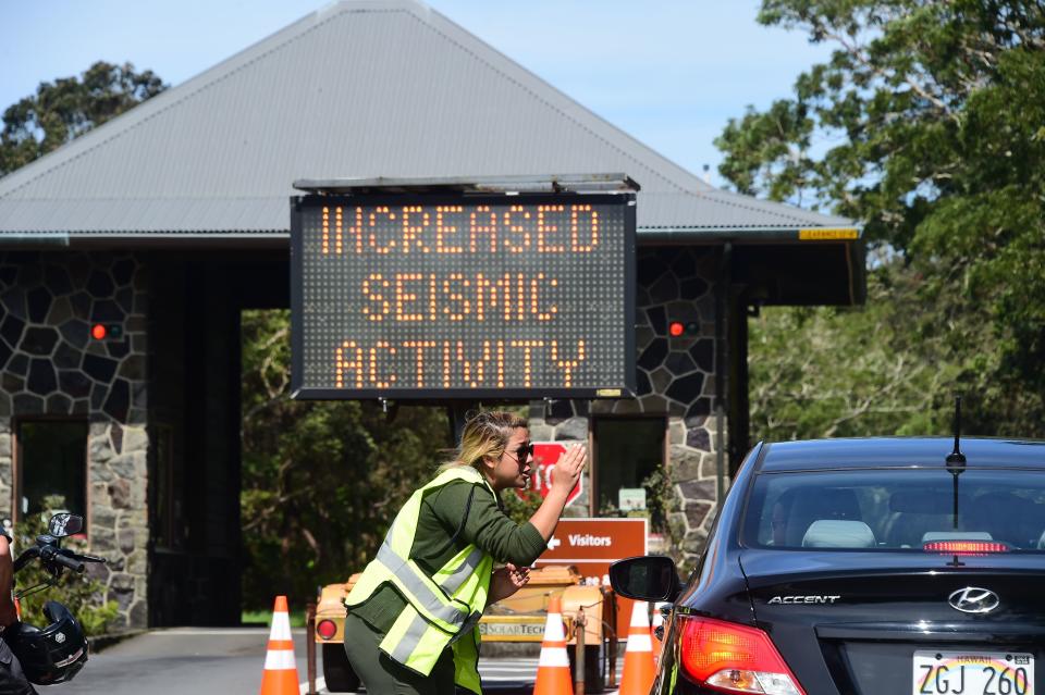 Park personnel at Hawaii Volcanoes National Park turn people away on Saturday&nbsp;after the park closed a day earlier due to dangerous volcanic activity.