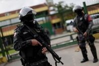 Soldiers of the military police are seen during a security operation outside of Puraquequara prison in Manaus after some prisoners were relocated following a deadly revolt, January 5, 2017. REUTERS/Ueslei Marcelino