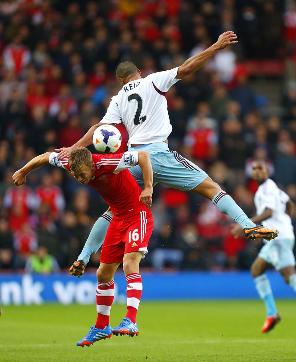 West Ham United's Winston Reid (right) and Southampton's James Ward-Prowse battle for the ball