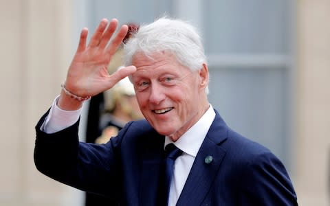 Former US President Bill Clinton arrives at the Elysee Palace after a service at Saint Sulpice church for late French President Jacques Chirac - Credit: &nbsp;Kamil Zihnioglu/AP