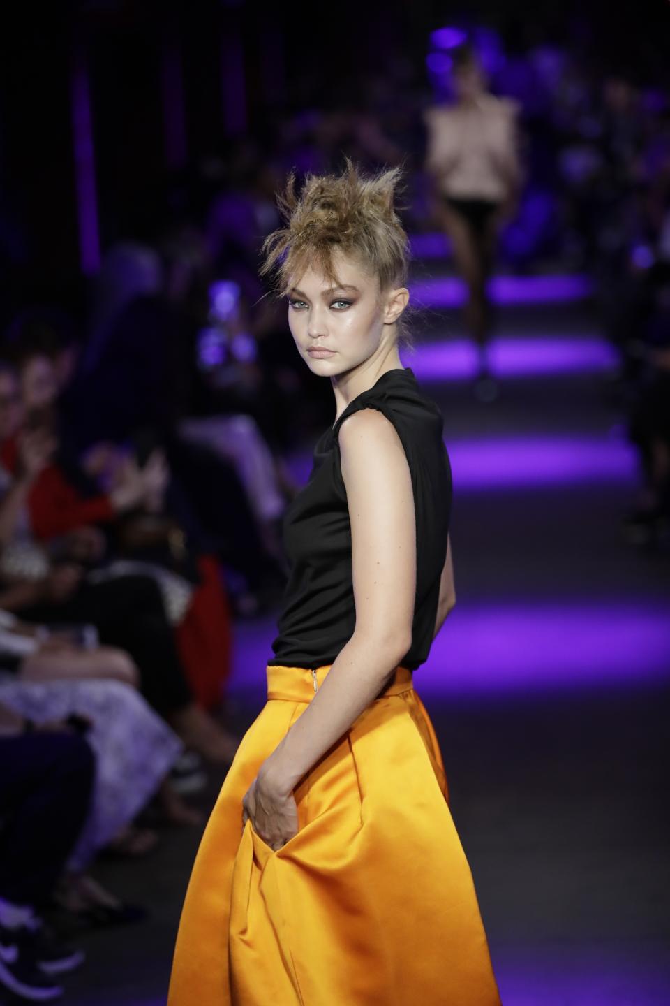 Fashion from the Tom Ford collection is modeled Monday, Sept. 9, 2019, in New York. (AP Photo/Frank Franklin II)