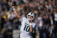 Michigan State quarterback Payton Thorne (10) throws for a touchdown during the first half of an NCAA college football game against Purdue in West Lafayette, Ind., Saturday, Nov. 6, 2021. (AP Photo/Michael Conroy)