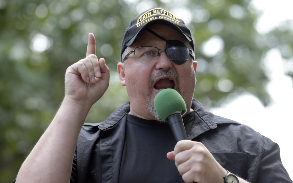 Stewart Rhodes, founder of the Oath Keepers, speaks during a rally outside the White House in Washington in 2017. (Susan Walsh/AP)