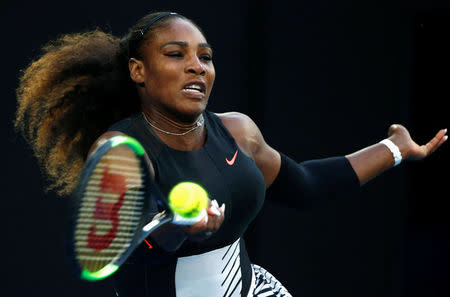 FILE PHOTO: Tennis - Australian Open - Melbourne Park, Melbourne, Australia - 28/1/17 Serena Williams of the U.S. hits a shot during her Women's singles final match against Venus Williams of the U.S. .REUTERS/Thomas Peter/File Photo