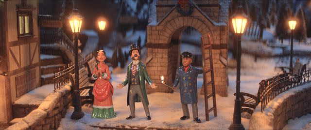 <p>Courtesy of Prime Video</p> Robin Thede, Nick Offerman and Chris Redd in 'Candy Cane Lane'