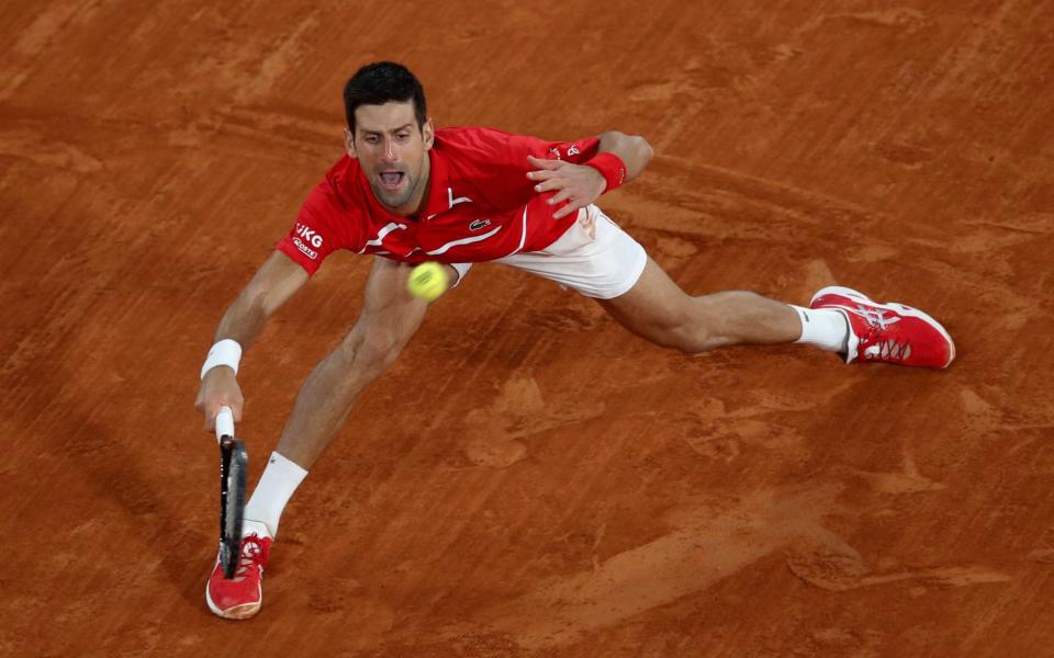 The world No.1 was at his athletic best during the five-set thriller at Roland Garros  - AP