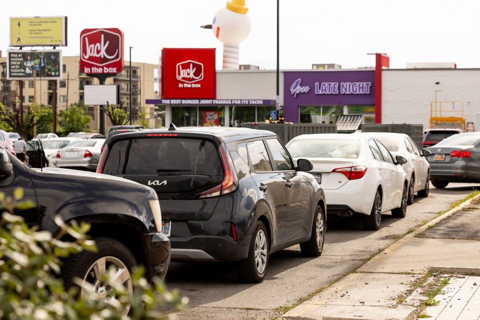 Cars queue for the drive-thru at the recently opened Jack in the Box on State Street in Salt Lake City on Tuesday, June 27, 2023. | Spenser Heaps, Deseret News