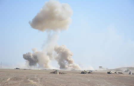 Smoke rises from clashes during a battle with Islamic State militants, west of Mosul,Iraq February 22, 2017. REUTERS/Stringer