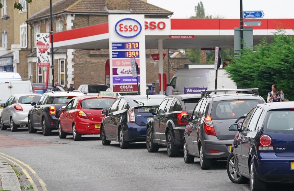 Motorists queue at an Esso petrol station in Brockley, south London (Dominic Lipinski/PA) (PA Wire)