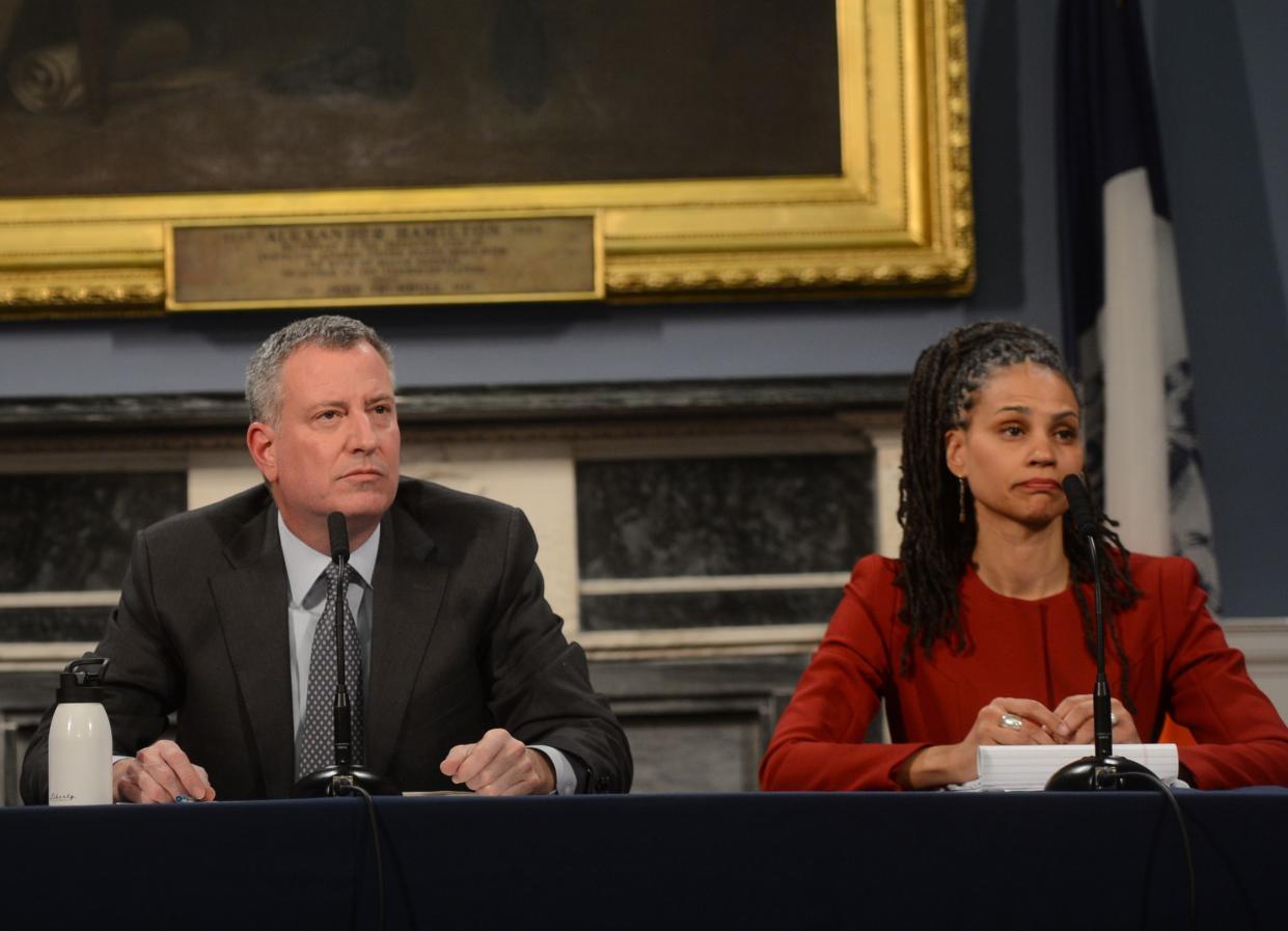 Mayor de Blasio hosts a Minority and Women's Business Enterprise Stakeholder Meeting in the Blue Room at City Hall on Feb. 23, 2015. At right is Council to the Mayor Maya Wiley. 