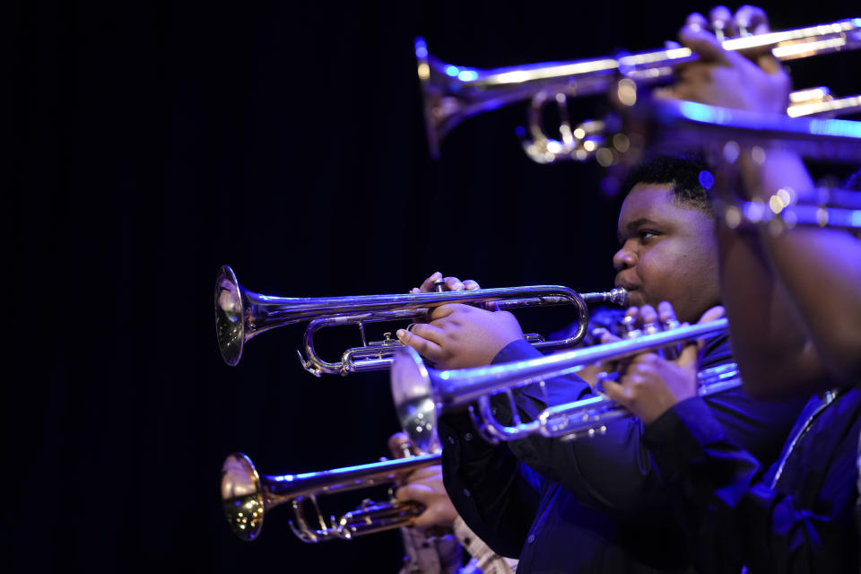 Students from the Ellis Maralis Center at The Musician's Village perform after Branford Marsalis was introduced as the new artistic director in New Orleans, Tuesday, Jan. 30, 2024. (AP Photo/Gerald Herbert)