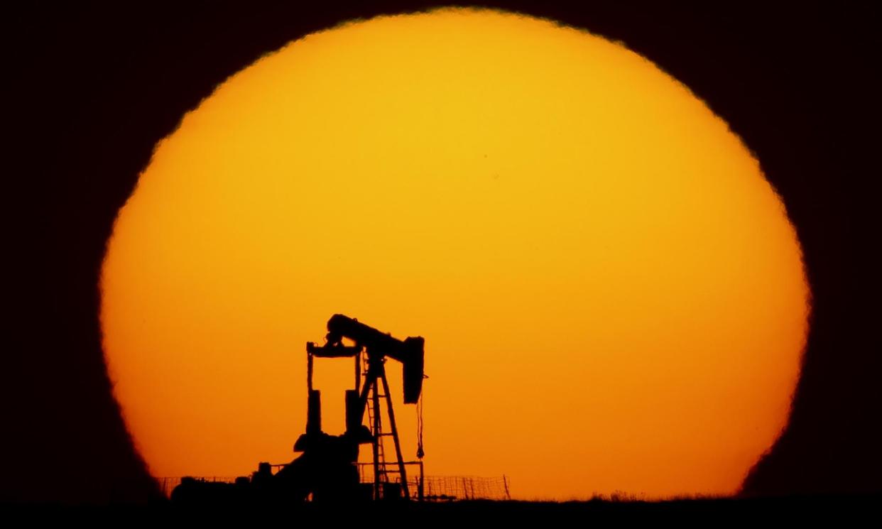 <span>BP’s outlook report predicts oil use will increase by about 2m barrels a day to peak at about 102m in 2025 across both of its forecasts.</span><span>Photograph: Charlie Riedel/AP</span>