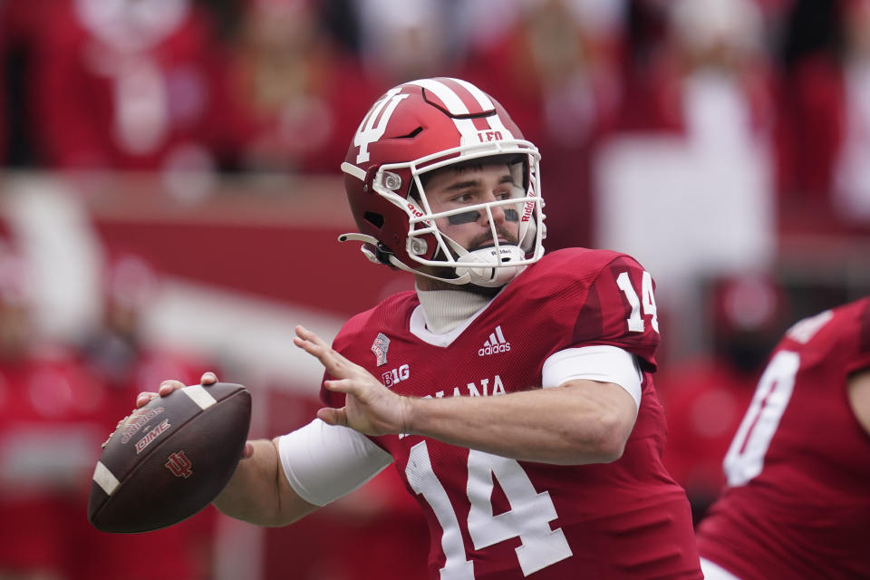 Indiana quarterback Jack Tuttle (14) throws during the first half of an NCAA college football game against Rutgers, Saturday, Nov. 13, 2021, in Bloomington, Ind. (AP Photo/Darron Cummings)