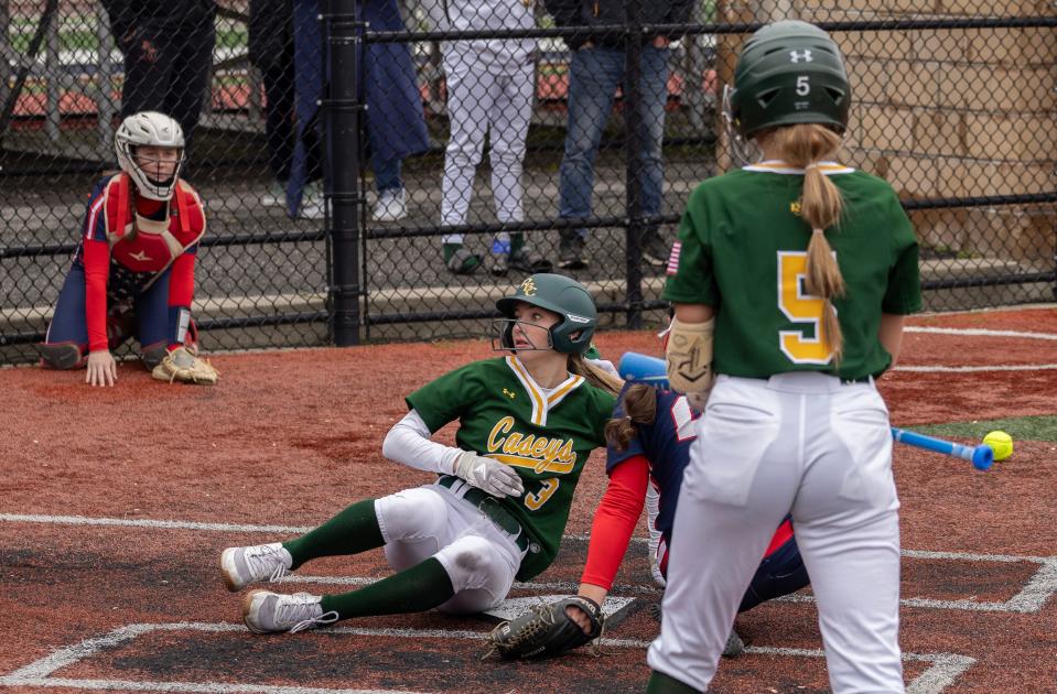 RBC Grace Lombardi scores on a wild pitch in the third inning make it 3-1. Red Bank Catholic Girls Softball defeats Wall 6-2 in home game on April 4, 2024