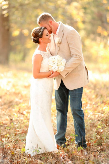 Caleb and Casey had a very unwanted guest crash their wedding photos. Photo: Ashley Wills Photography