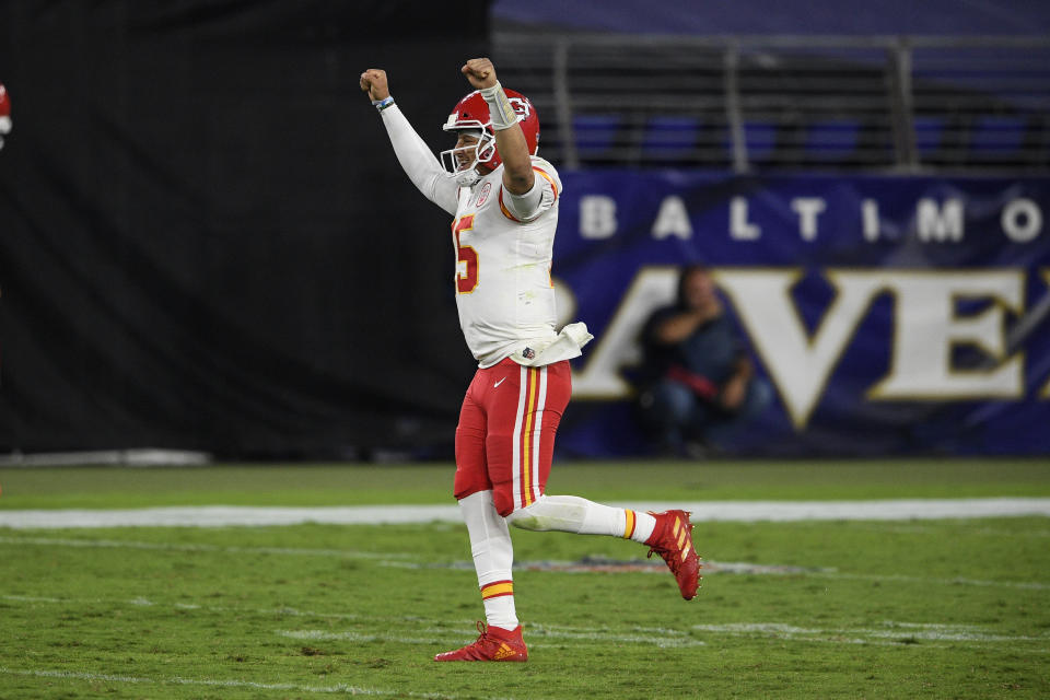 Kansas City Chiefs quarterback Patrick Mahomes celebrates his touchdown pass to offensive tackle Eric Fisher during the second half of an NFL football game against the Baltimore Ravens, Monday, Sept. 28, 2020, in Baltimore. (AP Photo/Nick Wass)