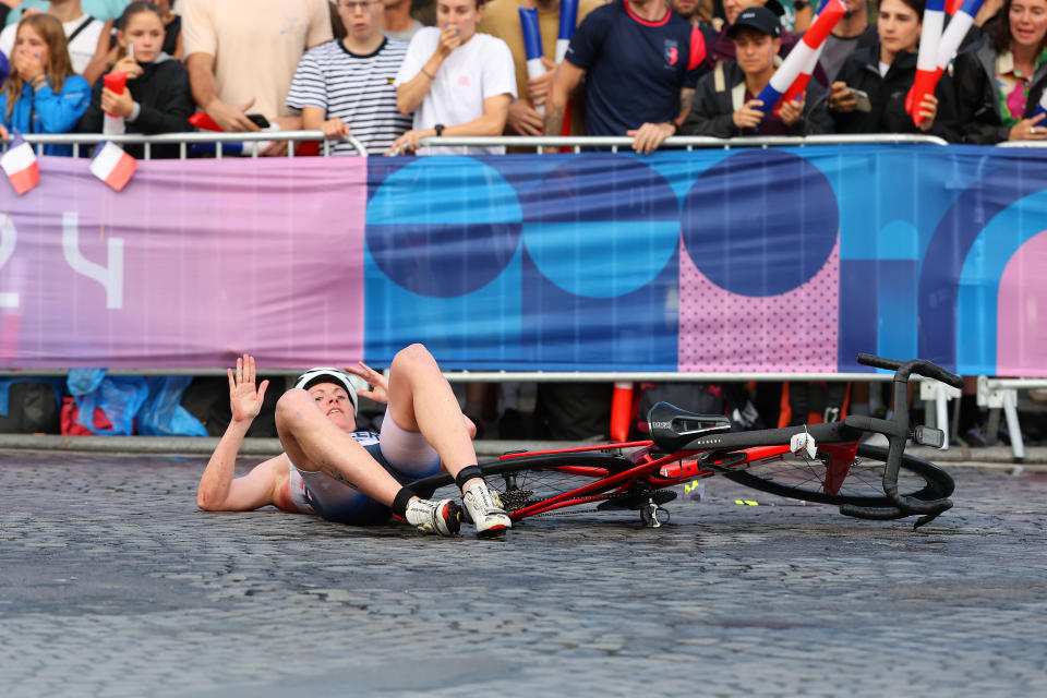 PARIS, FRANCE - JULY 31: Lotte Miller of Team Norway is seen after a fall during Women's Individual Triathlon on day five of the Olympic Games Paris 2024 at Pont Alexandre III on July 31, 2024 in Paris, France. (Photo by Lars Baron/Getty Images)