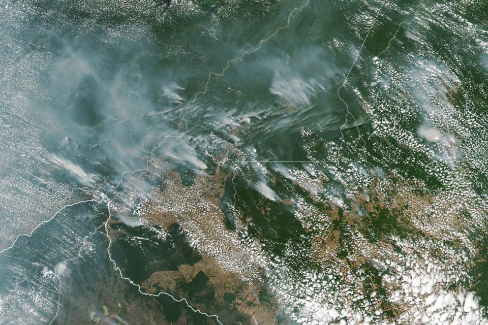 Fires have been raging at a record rate in Brazil’s Amazon rainforest for weeks, threatening wildlife and Earth’s oxygen in a disaster that activists say could drive further climate change. There have been 72,843 fires in Brazil this year (with more than half in its Amazon region), and satellite images have spotted 9,507 new forest fires in the county — mostly in the Amazon basin — since Aug. 15, according <a href="https://www.cnn.com/2019/08/21/americas/amazon-rainforest-fire-intl-hnk-trnd/index.html" rel="nofollow noopener" target="_blank" data-ylk="slk:to CNN;elm:context_link;itc:0;sec:content-canvas" class="link ">to CNN</a> and <a href="https://www.reuters.com/article/us-brazil-environment-wildfires/amazon-burning-brazil-reports-record-forest-fires-idUSKCN1VA1UK" rel="nofollow noopener" target="_blank" data-ylk="slk:Reuters;elm:context_link;itc:0;sec:content-canvas" class="link ">Reuters</a>, both citing Brazil’s National Institute for Space Research (INPE).