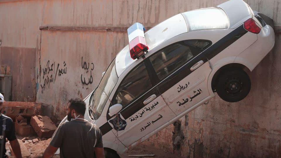 A damaged police car in Derna, Libya, on September 11, 2023. - Handout/Anadolu Agency/Getty Images