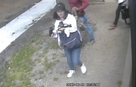 Chinese student Yingying Zhang is seen in a still image from security camera video taken outside an MTD Teal line bus in Urbana, Illinois, U.S. June 9, 2017. University of Illinois Police/Handout via REUTERS