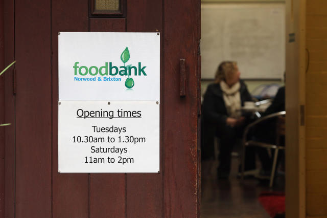 LONDON, ENGLAND - OCTOBER 23:  A sign directs to a Food Bank depot outside St. Paul&#39;s Church in Brixton on October 23, 2012 in London, England. The need for food banks has increased with around three depots opening across the UK each week. The Trussell Trust, the charity running food banks, have said that record numbers of people have required emergency food over the last six months and they expect to feed 200,000 over the next year. Vulnerable people of all ages, nationalities and backgrounds, many of whom have fallen out of the benefit system and have no other way to feed themselves and their families, are using food banks.  (Photo by Dan Kitwood/Getty Images)