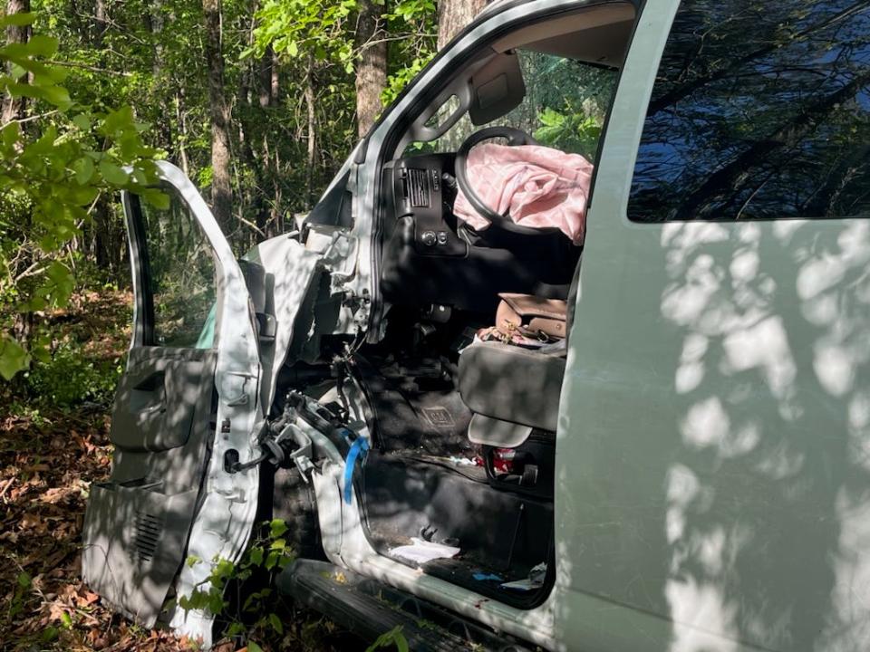 A van carrying children and one adult is pictured after crashing into tree just outside of Pinson, Alabama on its way to Kermit Johnson Elementary School.