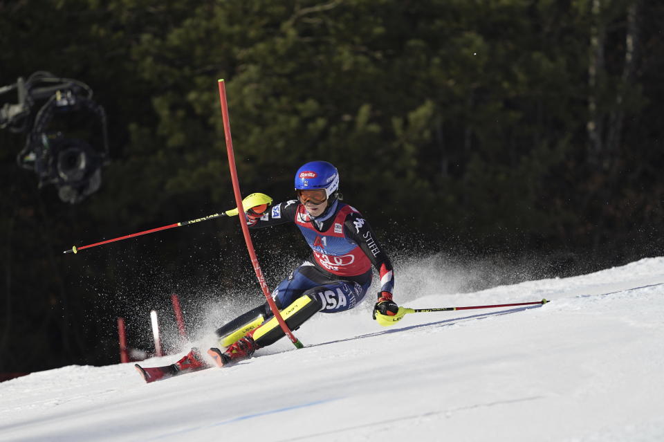 United States' Mikaela Shiffrin speeds down the course during an alpine ski, women's World Cup slalom race, in Lienz, Austria, Friday, Dec. 29, 2023. (AP Photo/Giovanni Auletta)