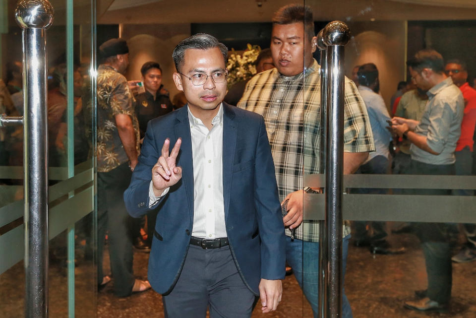 Fahmi Fadzil leaves Eastin Hotel after meeting with PH presidential council in Petaling Jaya Petaling Jaya February 27, 2020. — Picture by Ahmad Zamzahuri