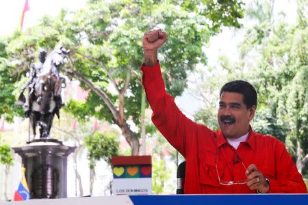 Venezuela's President Nicolas Maduro gestures while he speaks during his weekly broadcast "Los Domingos con Maduro" (The Sundays with Maduro) in Caracas, Venezuela July 23, 2017. Miraflores Palace/Handout via REUTERS