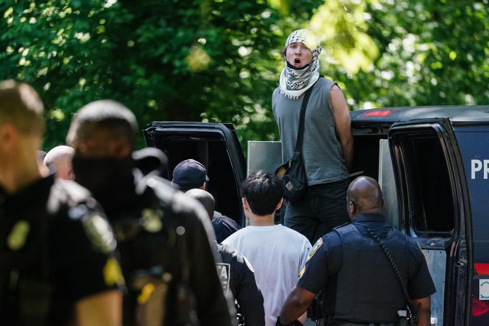 A protester is arrested at Emory University, April 25, 2024.