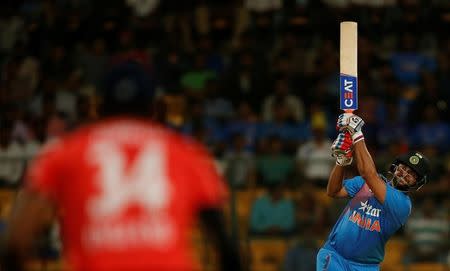 Cricket - India v England - Third T20 International - M Chinnaswamy Stadium, Bengaluru, India - 01/02/17. India's Suresh Raina plays a shot. REUTERS/Danish Siddiqui