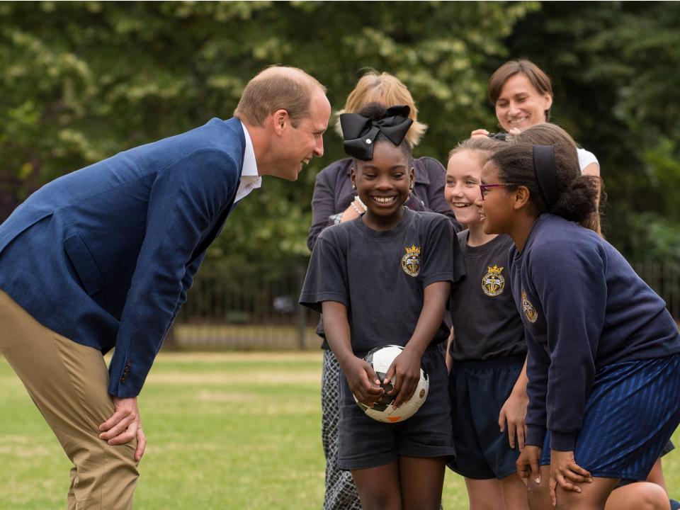 Prince William joins a girls' football practice