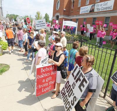 Protesters and counter-protesters outside the Planned Parenthood clinic in Mount Auburn in 2016.