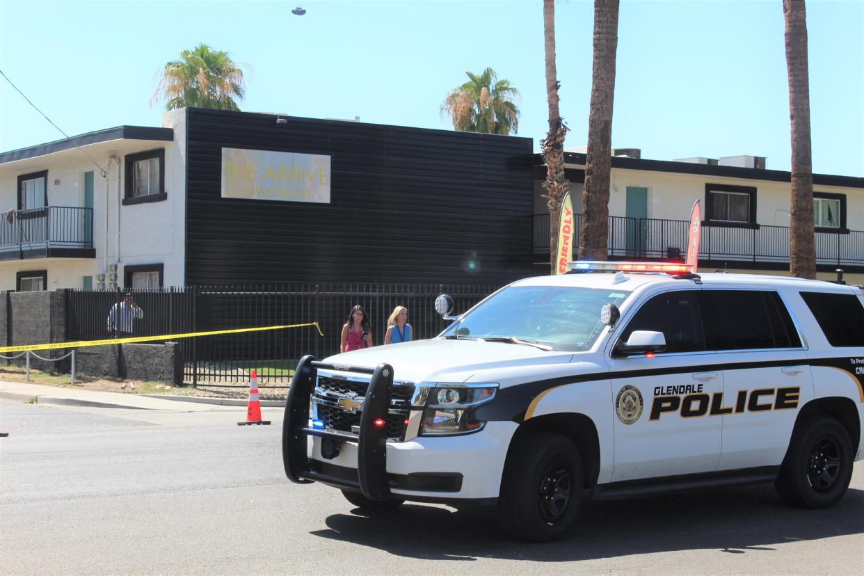 Glendale Police Department officers block off a parking lot on 63rd and W. Citrus Way near The Arrive Apartments complex in Glendale, Ariz. on July 6, 2022.