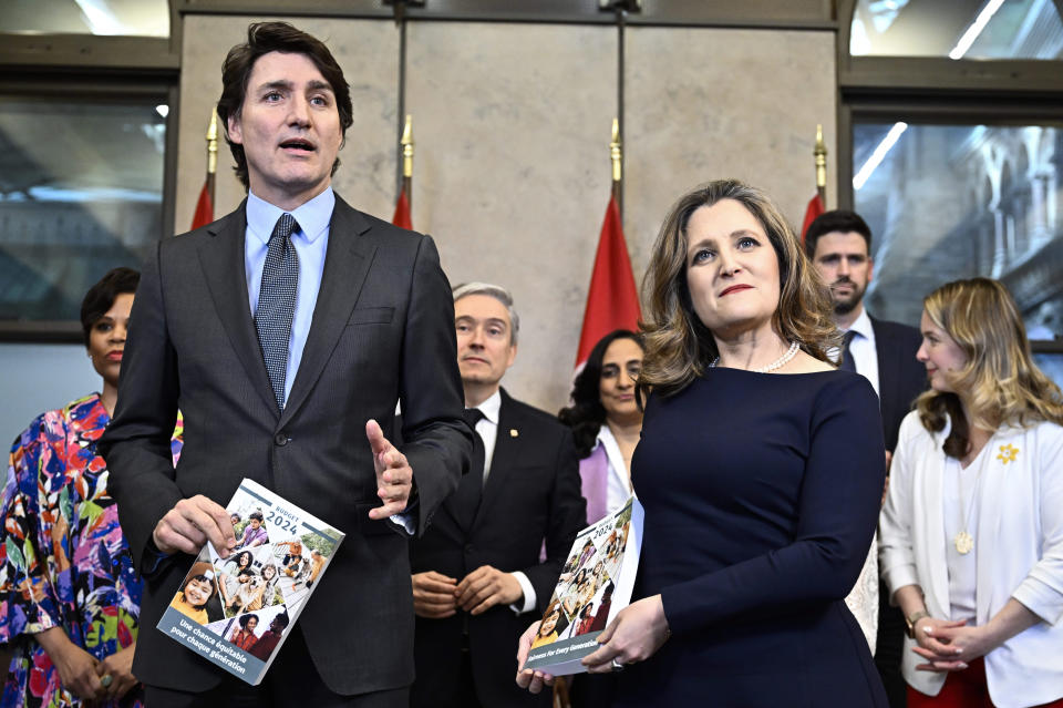 Canada's Prime Minister Justin Trudeau, Deputy Prime Minister, Minister of Finance Chrystia Freeland and cabinet ministers pose for a photo before the tabling of the federal budget on Parliament Hill in Ottawa, Ontario, on Tuesday, April 16, 2024. (Justin Tang/The Canadian Press via AP)