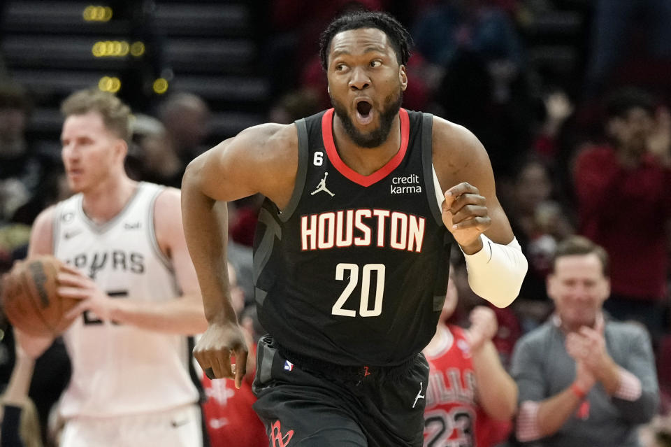 Houston Rockets forward Bruno Fernando (20) reacts after dunking during the first half of an NBA basketball game against the San Antonio Spurs, Monday, Dec. 19, 2022, in Houston. (AP Photo/Eric Christian Smith)